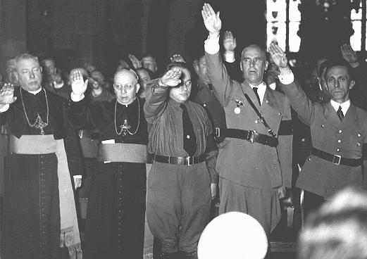 Catholic clergy and nazi officials giving the nazi salute in Germany